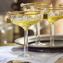 Raz Eric Cortina 4.5" Elegant Coupe Champagne Glass Christmas Ornament 4353121