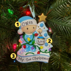 Baby Decorating A Tree Blue Personalized Christmas Ornament OR1847-B