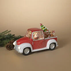 11.5" Battery Operated Santa In Red Truck Spinning Water Globe 2600550